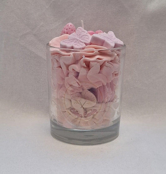 Cotton candy scented candle in clear glass jar, handmade and hand-poured, sweet nostalgic aroma, perfect for birthday gifts or cozy evenings.